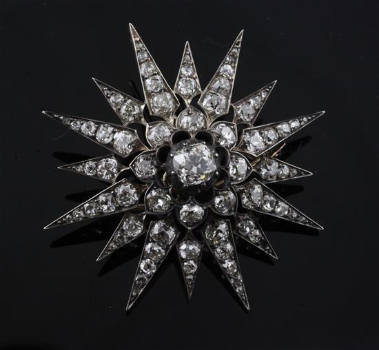 A Victorian gold, silver and diamond starburst pendant brooch, 54mm.